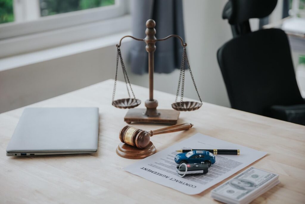 Car and documents and gavel