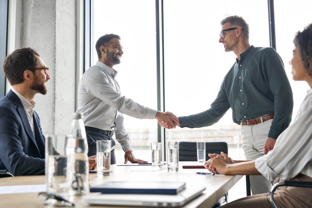 Shake hands after a successful meeting